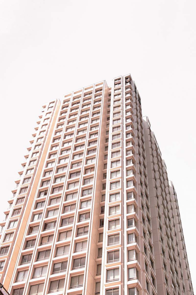 high rise beige high-rise building town